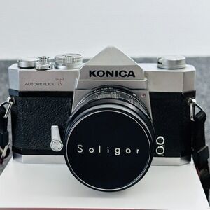 Konica Autoreflex T 35mm SLR Film Camera with Soligor Lens Silver Black UNTESTED
